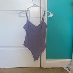 Forever 21 purple ribbed body suit. Size small. Good condition.